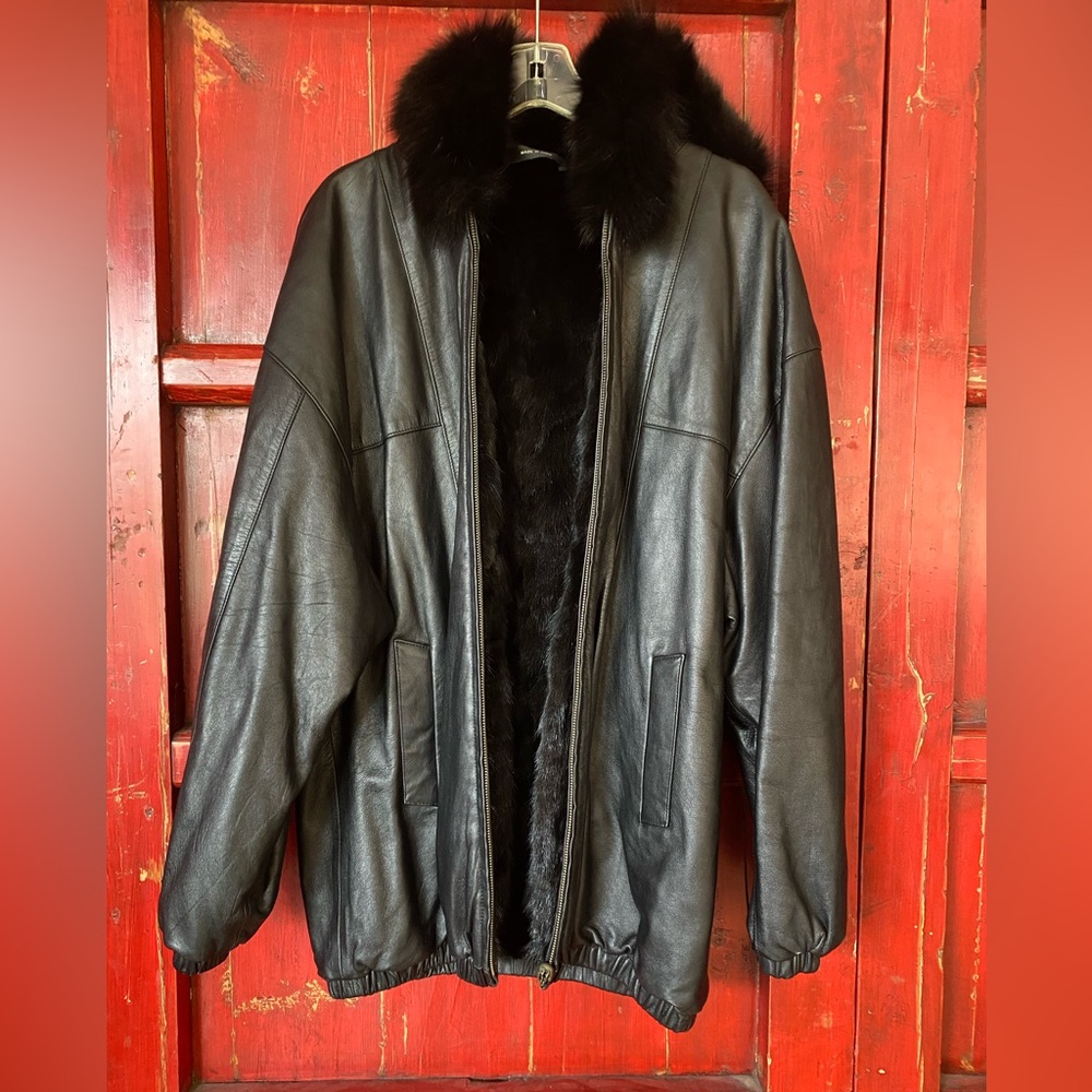 Black leather reversible coat. Ferrara collection size women’s Large.